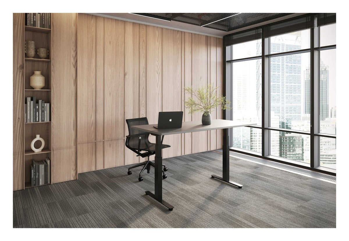 Apex Flyga Height Adjustable Desk, in an office
