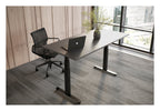 Apex Flyga Height Adjustable Desk, in an office