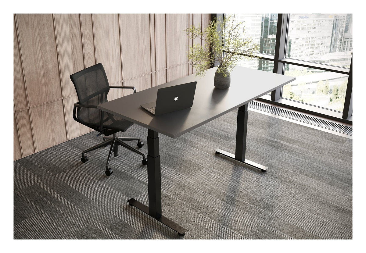 Apex Flyga Height Adjustable Desk, in an office