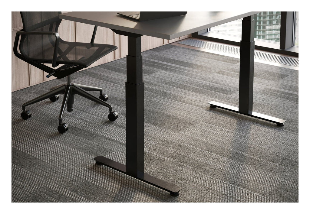 Apex Flyga Height Adjustable Desk, in an office
