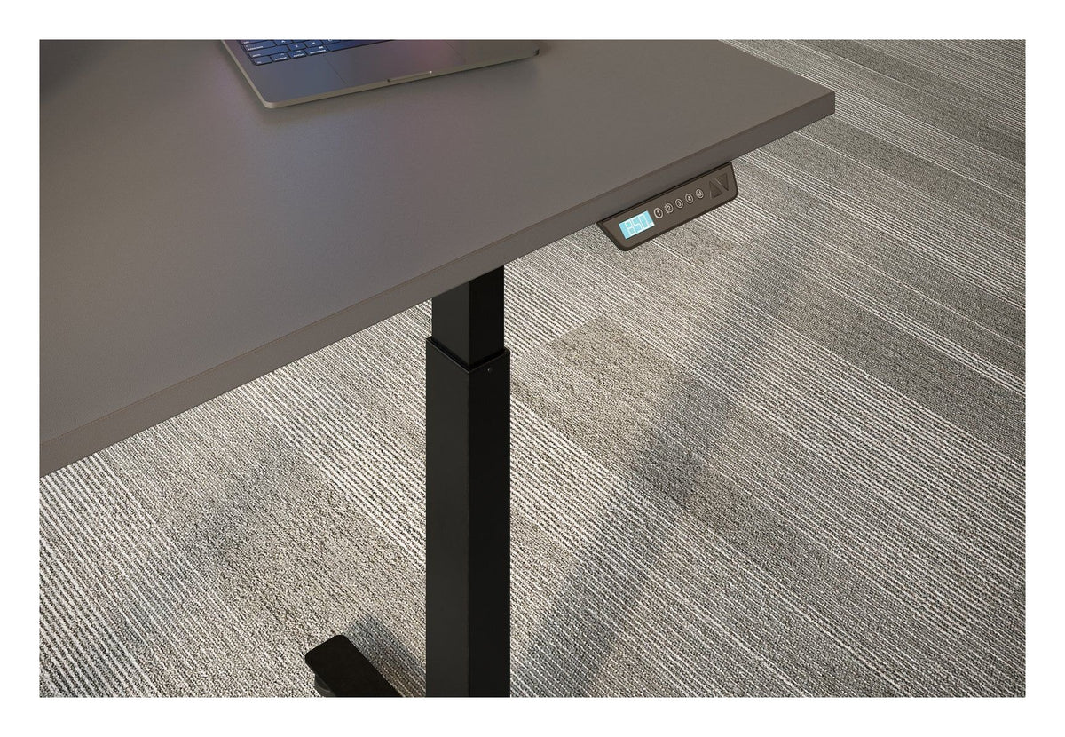 Apex Flyga Height Adjustable Desk, in an office