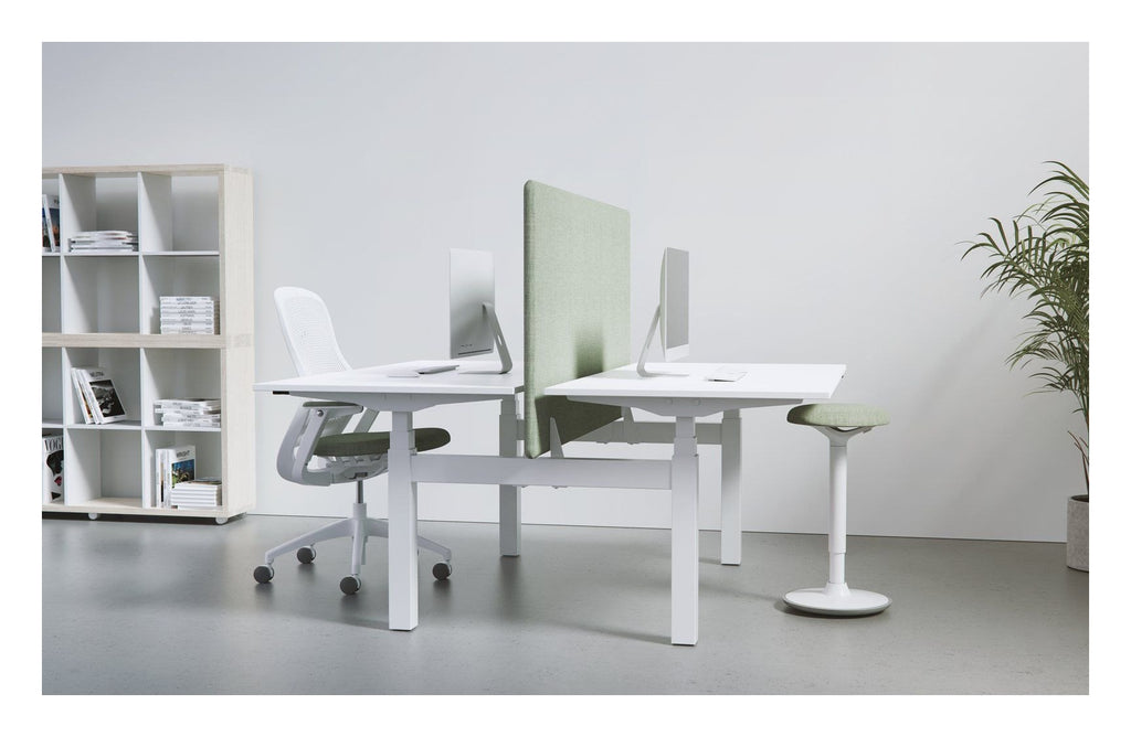 Apex Kompa Back to Back Height Adjustable Desks, in an office