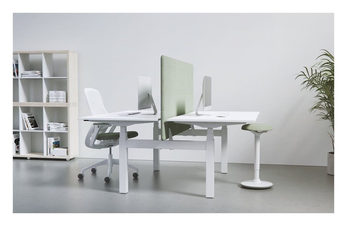 Apex Kompa Back to Back Height Adjustable Desks, in an office