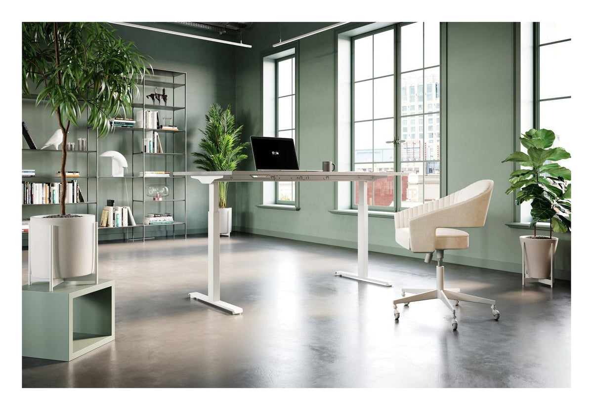 Apex Rusa Height Adjustable Desk, in an office