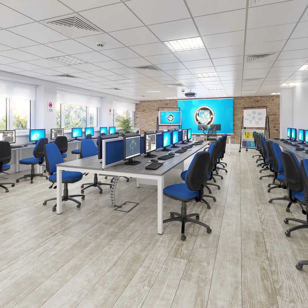 School computer classroom with rows of desks, monitors and blue chairs