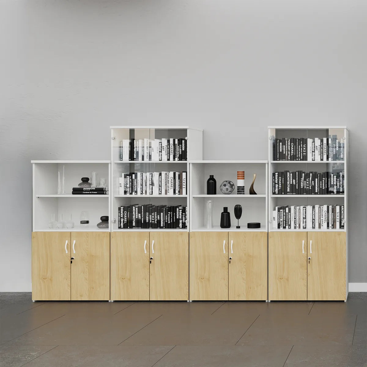 Oak cupboards topped with white bookcases holding books and ornaments