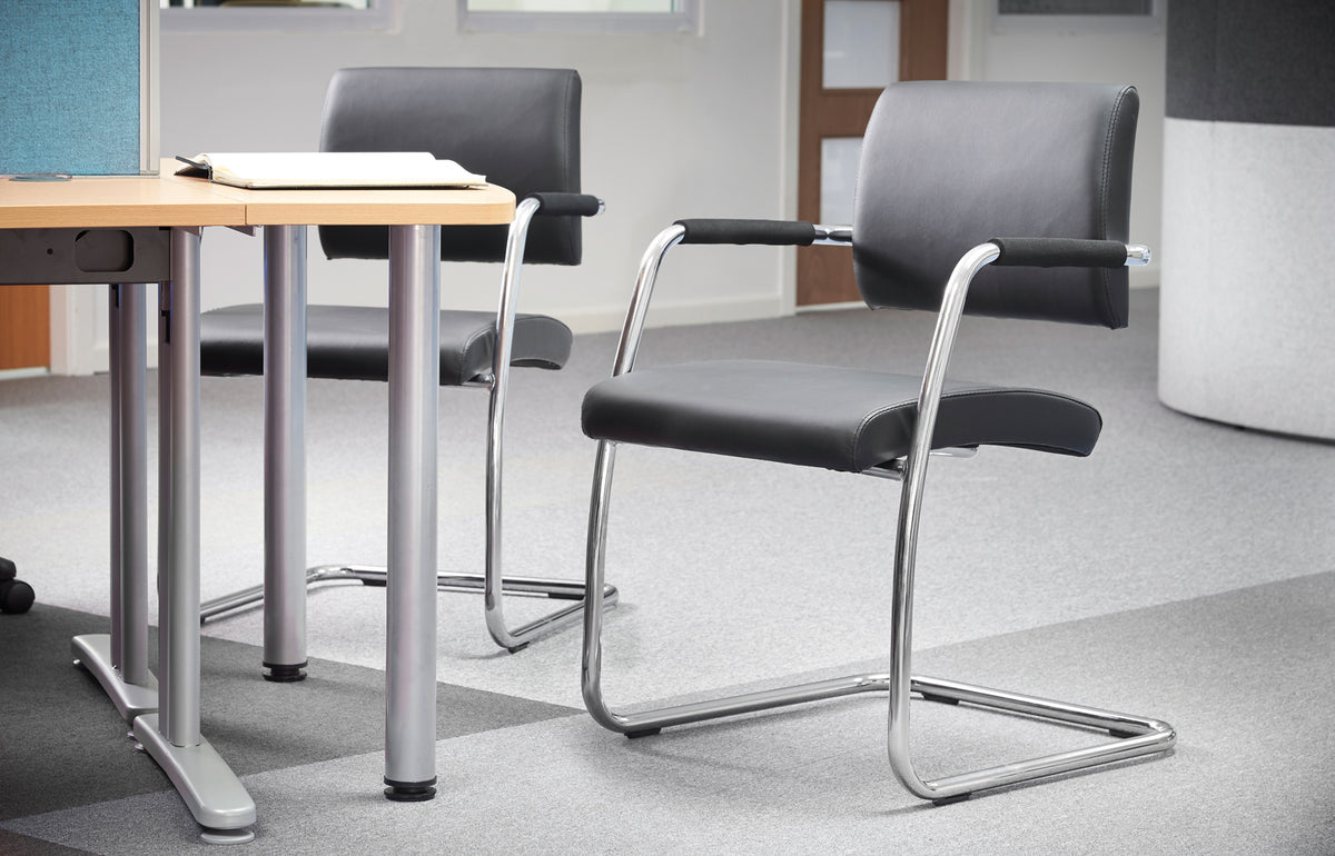 Bruges Leather Visitor Chairs (Pack of 2) in an office