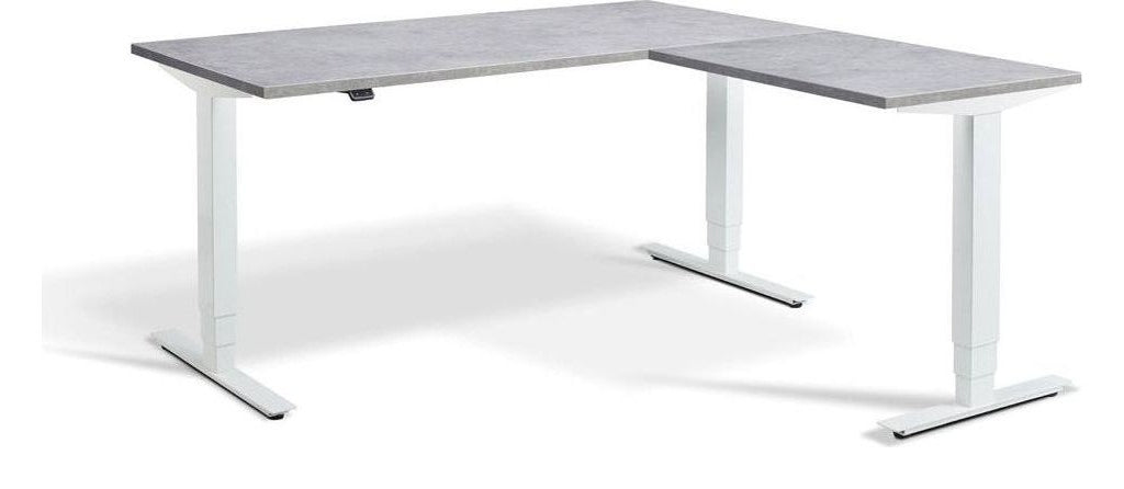 Apex Advance Corner Height Adjustable Desk, in an office