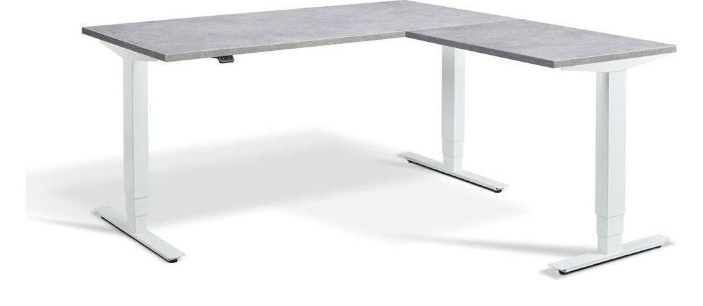 Apex Advance Corner Height Adjustable Desk, in an office