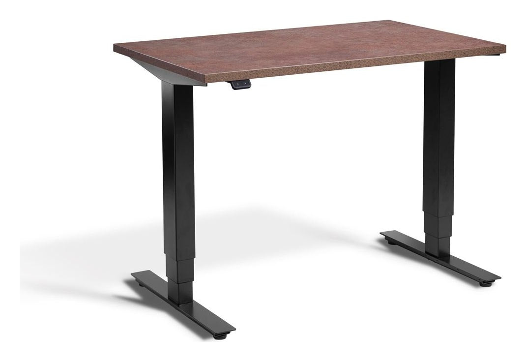 Apex Advance Mini Compact Height Adjustable Desk, in an office
