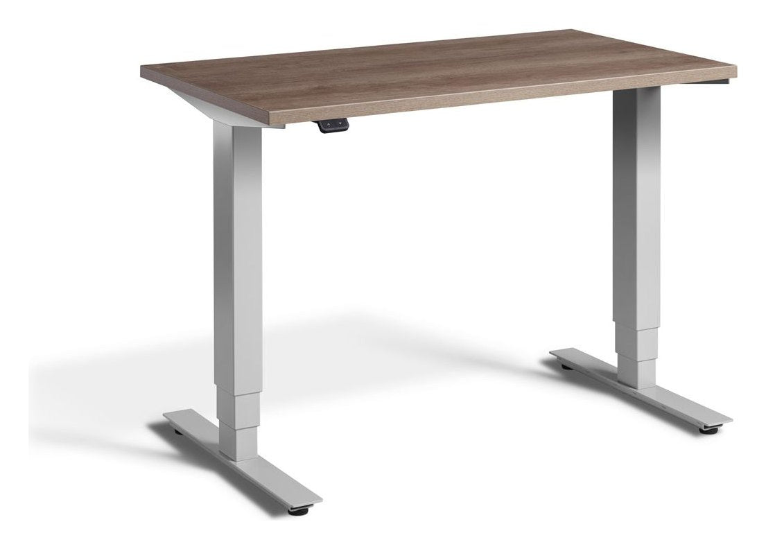 Apex Advance Mini Compact Height Adjustable Desk, in an office