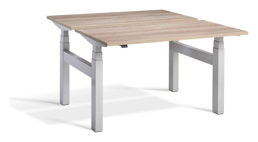 Apex Duo Heavy Duty Back to Back Height Adjustable Desks, in an office