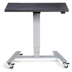 Apex Flex Mobile Height Adjustable Desk, in an office