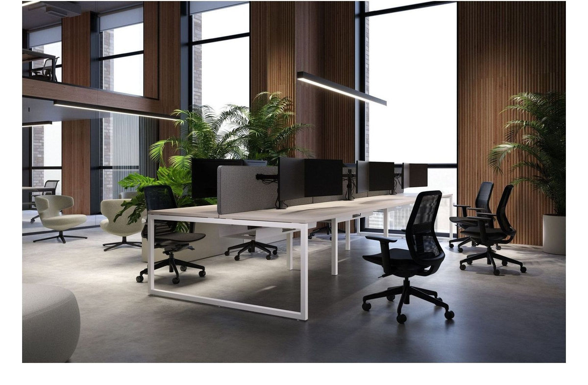 Apex Lanto 4 Person Bench Desk, in an office