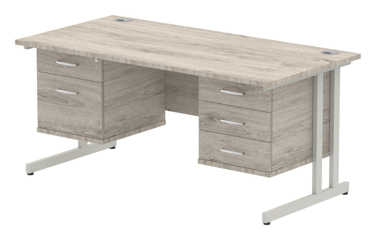 Impulse straight desk with cantilever legs and two fixed pedestals, 1600 x 800, a 2 and a 3 drawer pedestal, silver frame, grey oak top